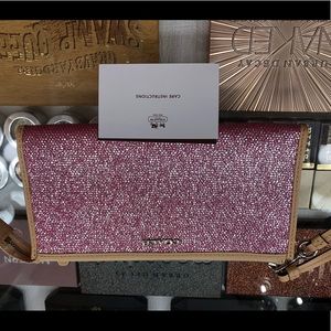 NWOT Pink metallic Coach Wallet Wristlet